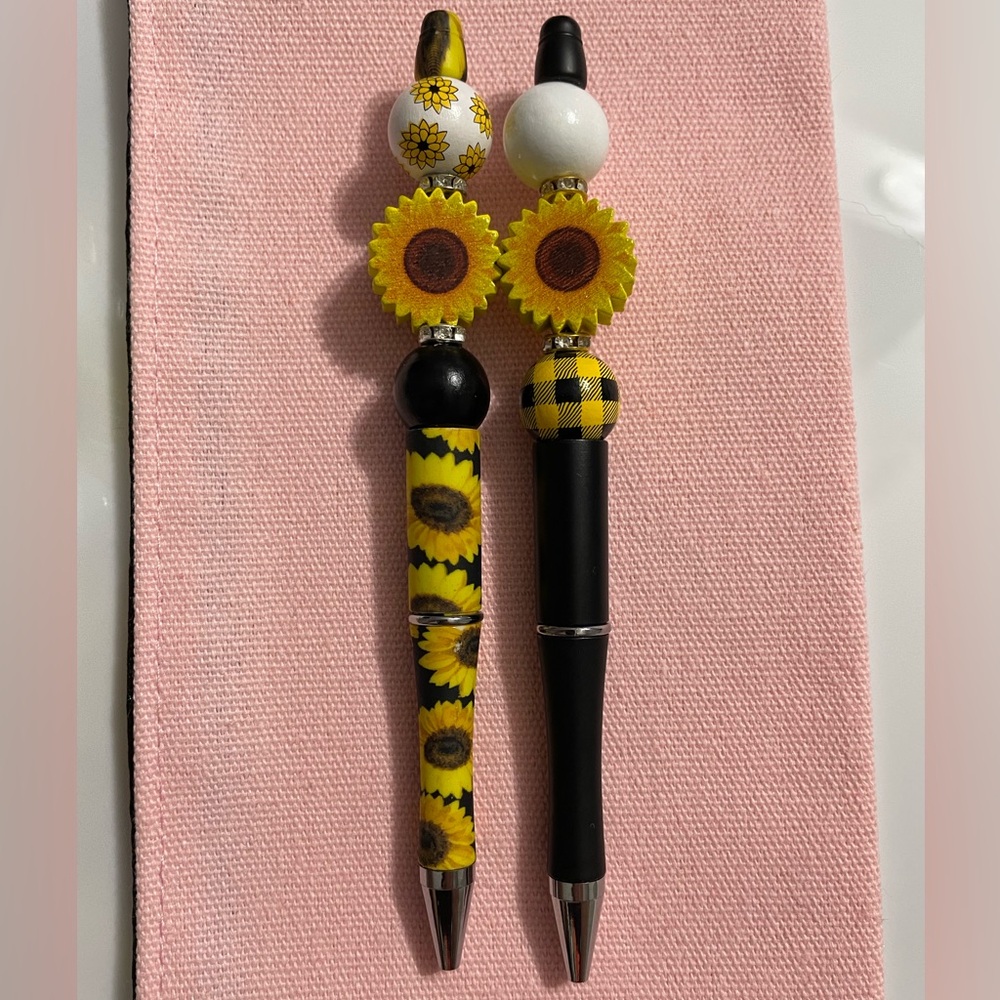 2 handcrafted sunflower pens